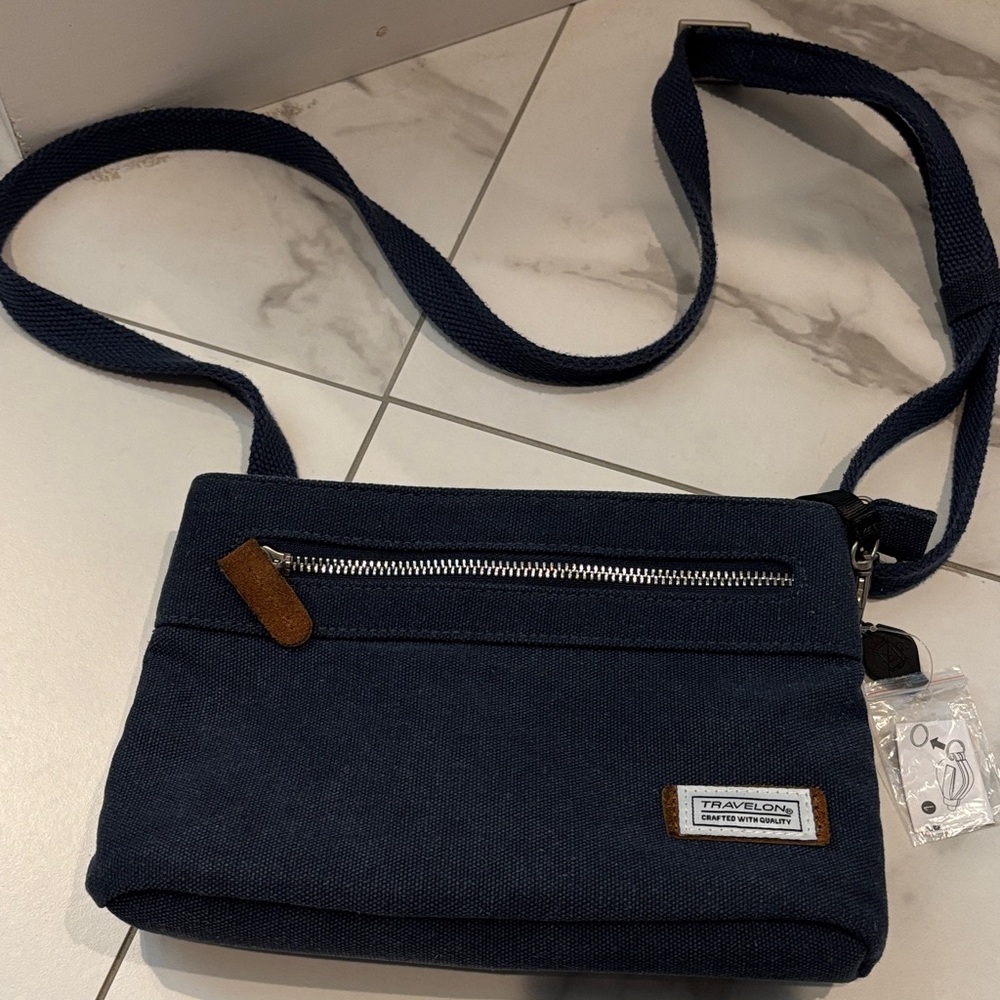 Travelon Dark Blue Messenger Bag with Brown Accents